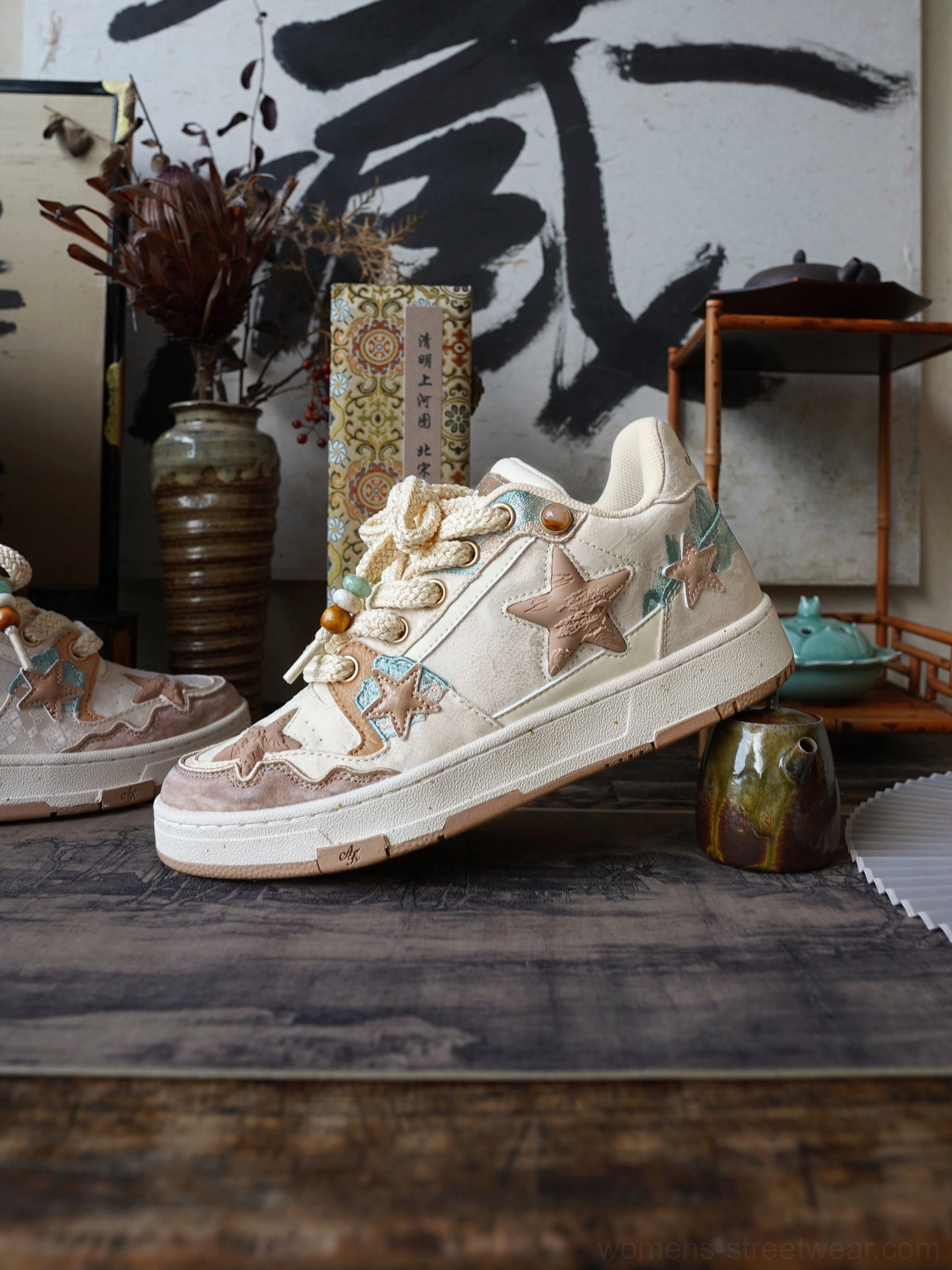 Beige and brown jacquard star panel retro court sneakers product detail for unisex streetwear styling