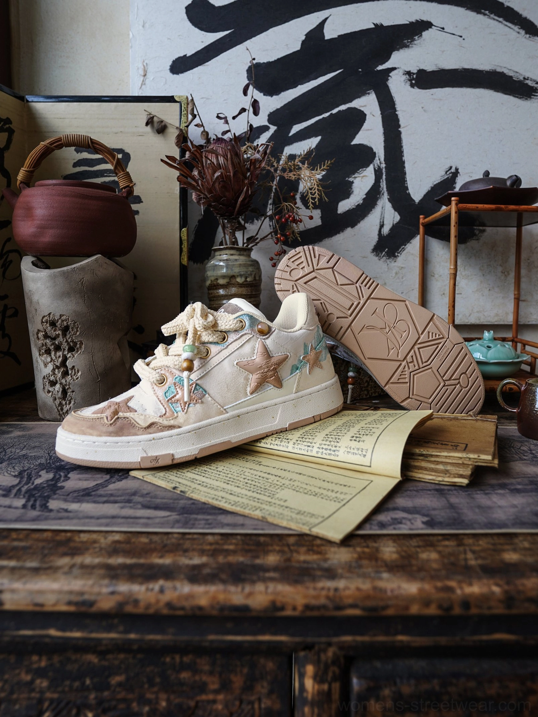 Textured beige and brown court sneakers with star panels, padded collar, mesh lining, and polymer rubber sole