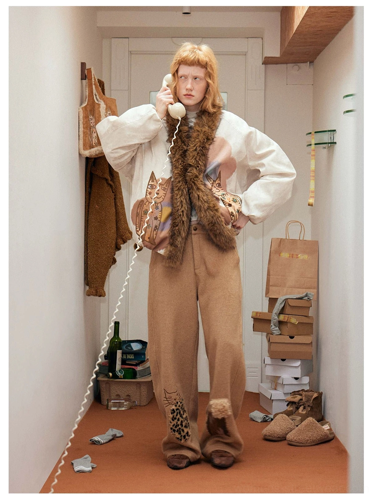 Beige cat graphic faux fur bomber jacket styled with khaki leopard patch wide leg pants and retro casual accessories
