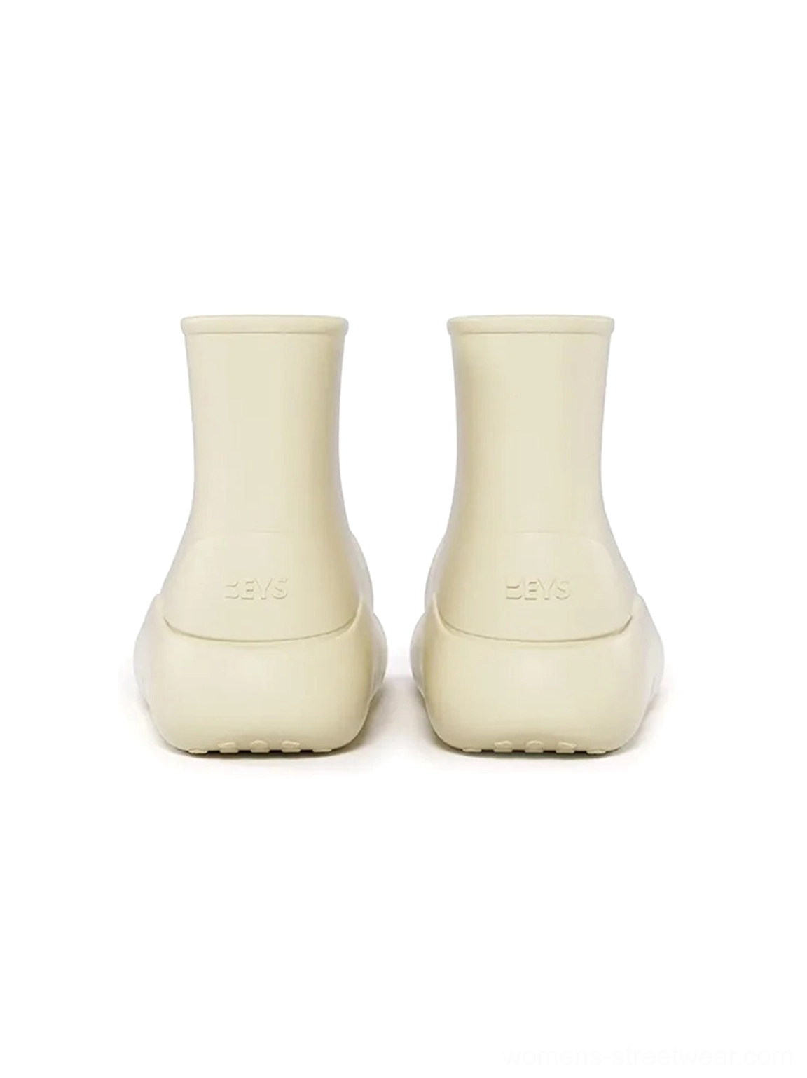 Back product view of beige chunky short rain boots with smooth matte rubber finish and thick sole