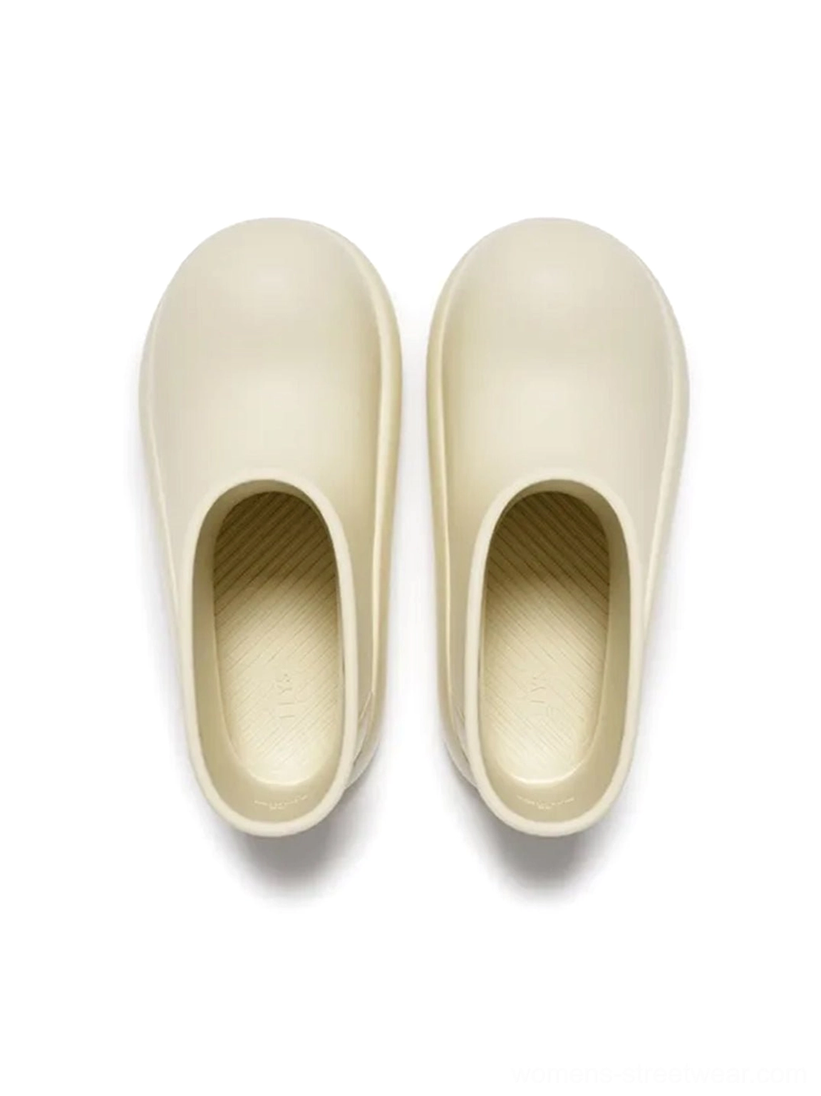 Front view of beige slip-on chunky rain booties with closed rounded toe and matching platform sole