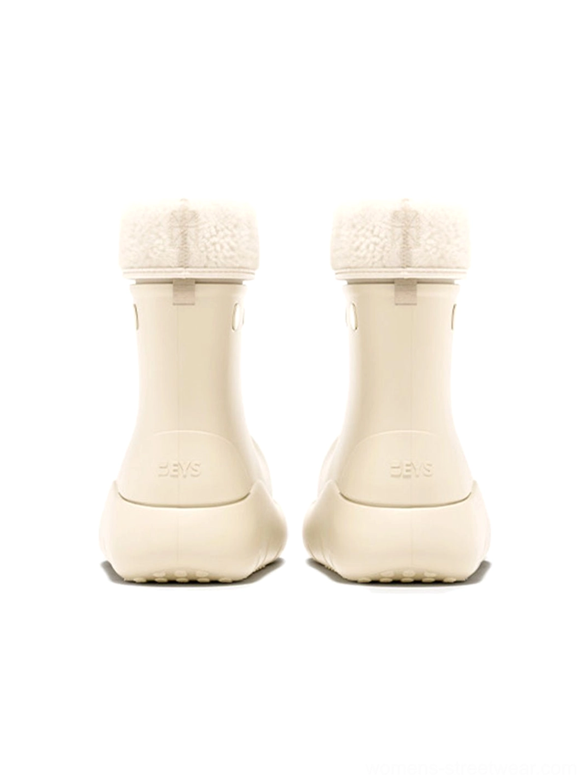 Rear view of beige faux fur lined platform winter boots showing zipper closure fluffy collar and raised sole