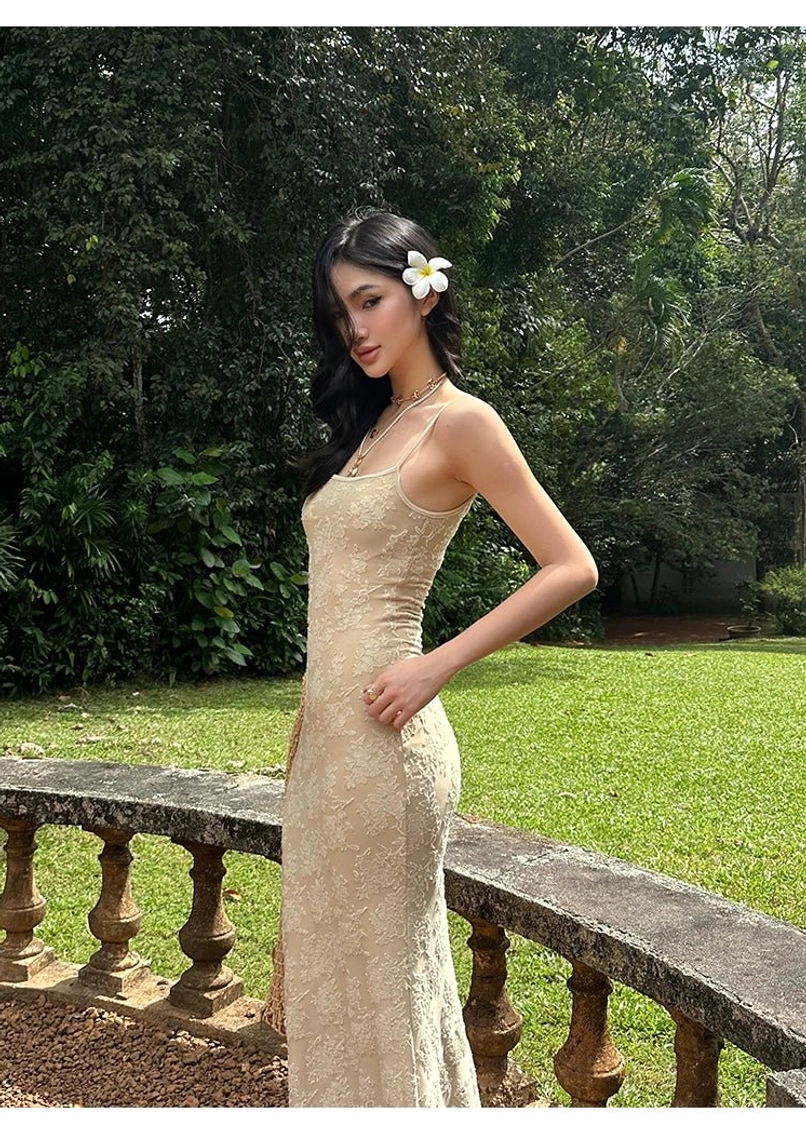 Beige lace maxi dress with fitted mermaid silhouette delicate floral texture and elegant floor-length design
