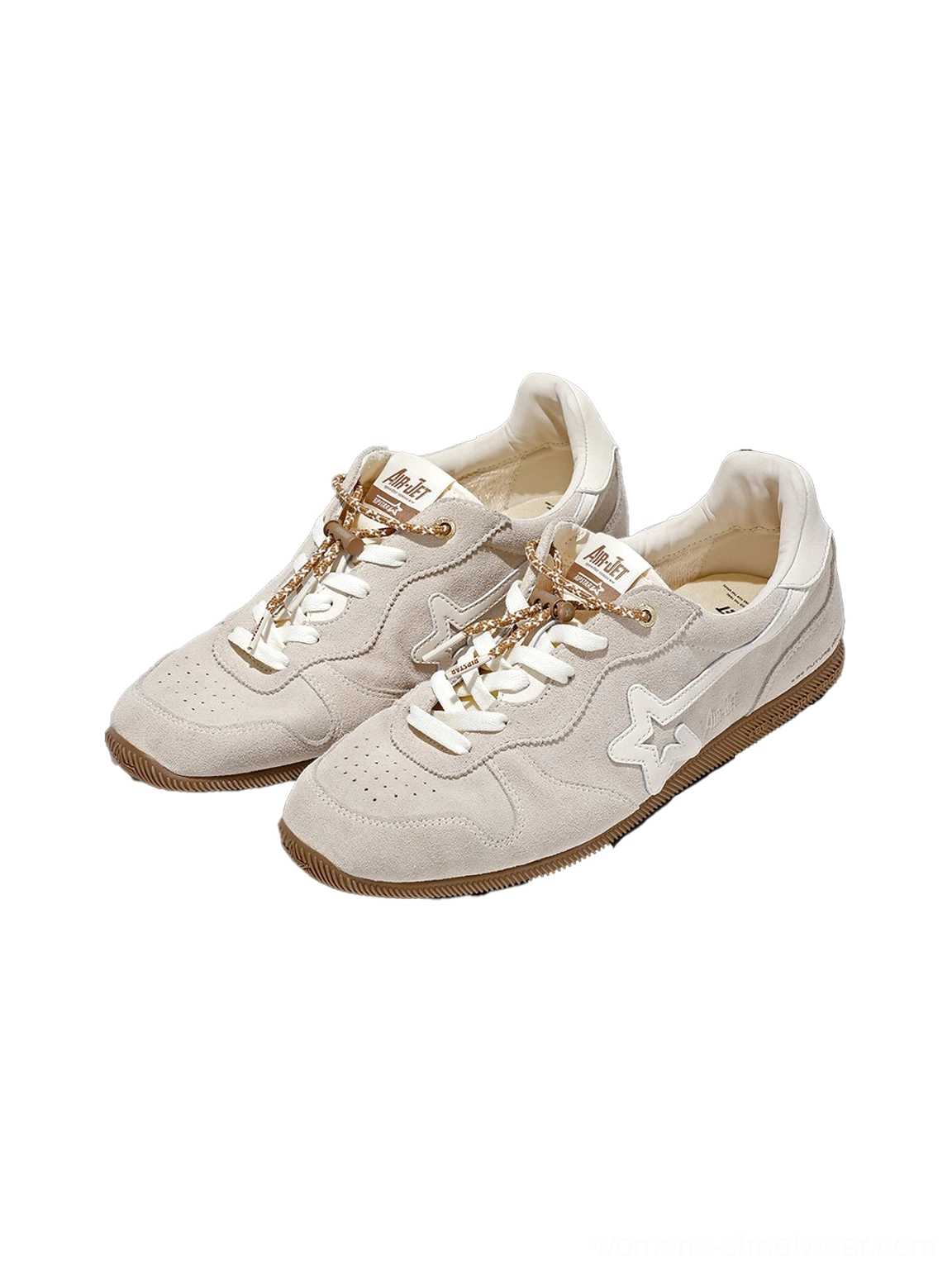 Beige low-profile retro suede panel sneakers with layered leather and textile construction, contrasting accents, and rubber outsoles