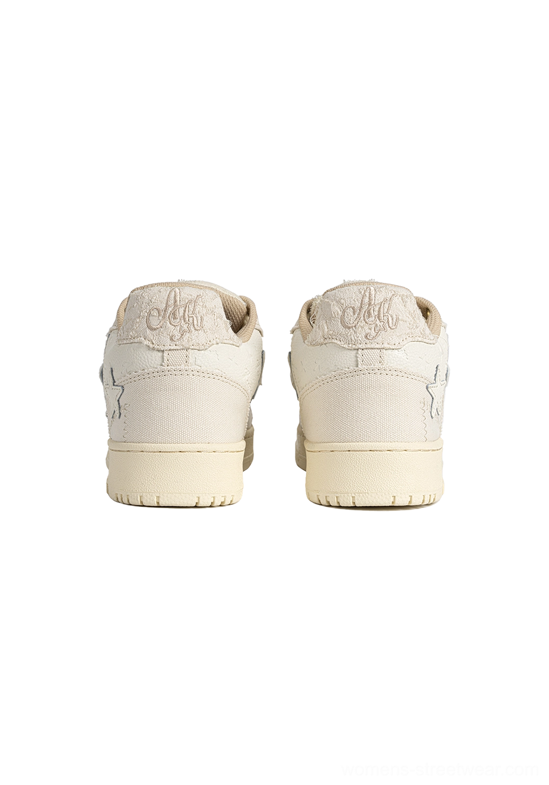 Beige low-top star sneakers featuring textured jacquard fabric, playful lace charms, chunky rope laces, and retro-inspired streetwear styling