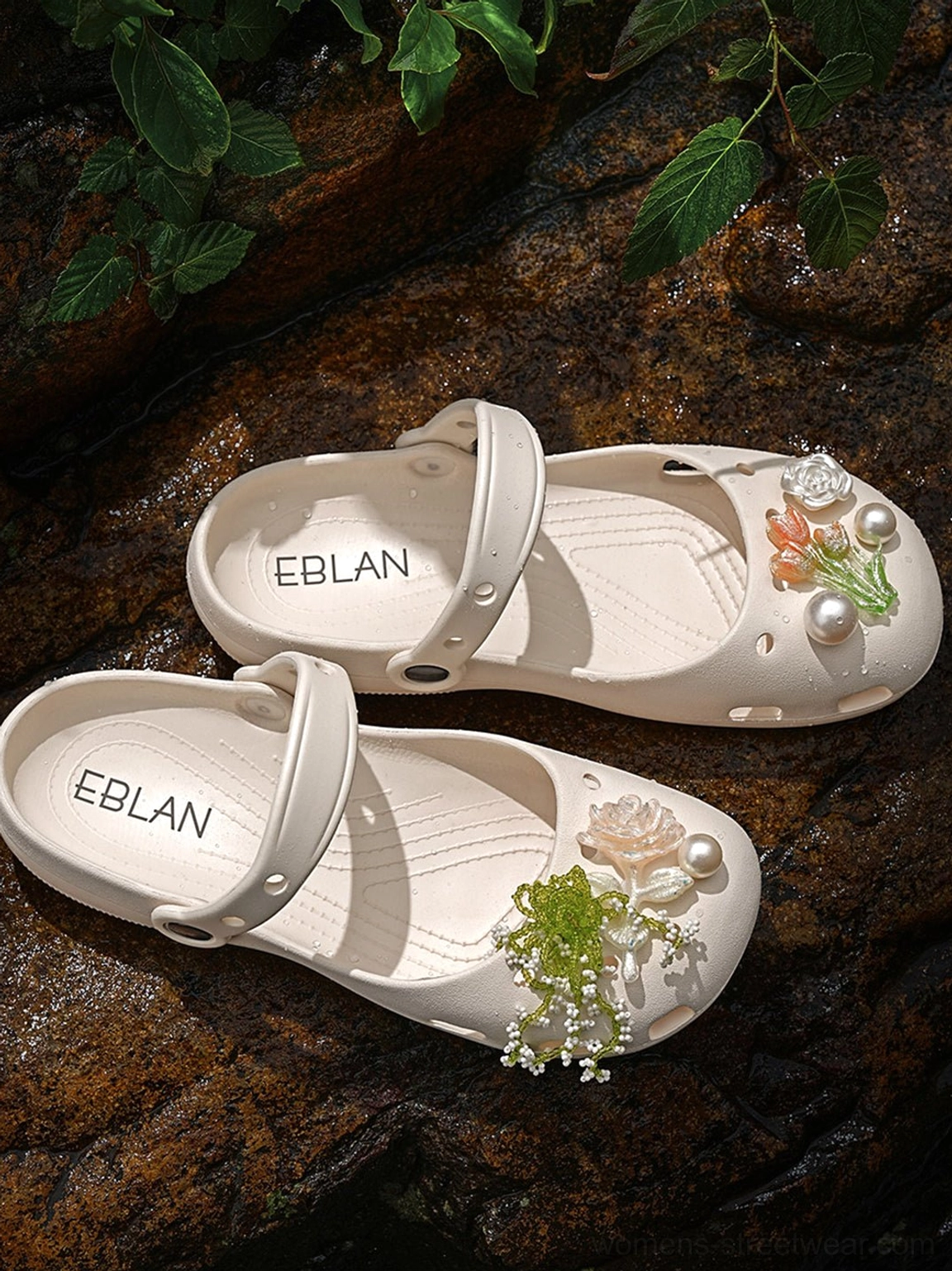 Beige decorative Mary Jane slide sandals shown from above with floral and pearl toe ornaments adjustable heel straps and open construction