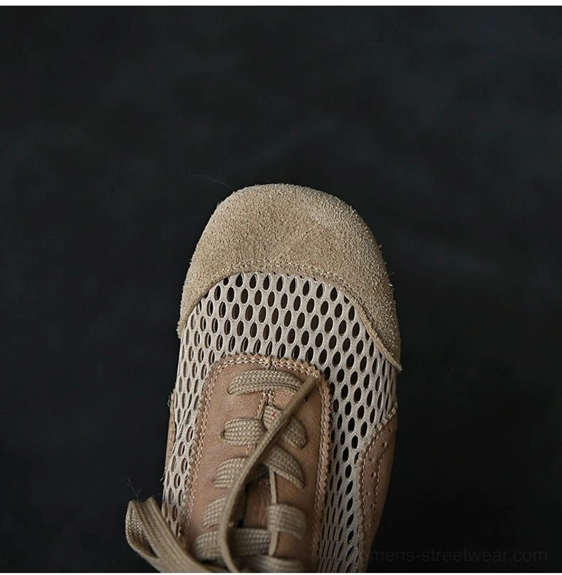 Close-up of beige perforated mesh suede sneakers showing breathable mesh texture, detailed lace eyelets, and soft suede toe cap