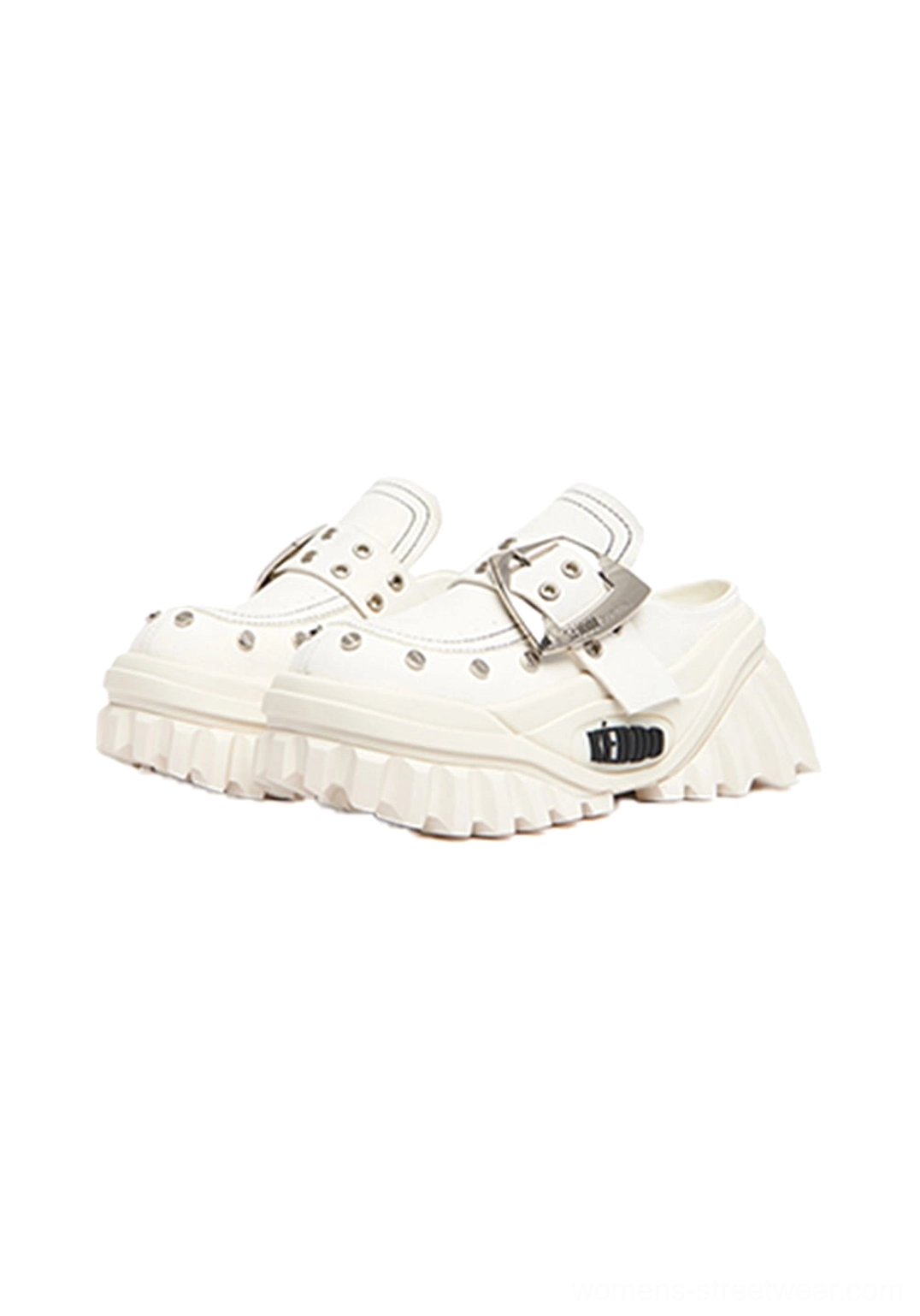 Pair of beige platform Mary Jane mule shoes displayed from above, featuring matching studded uppers, buckle straps, and chunky soles