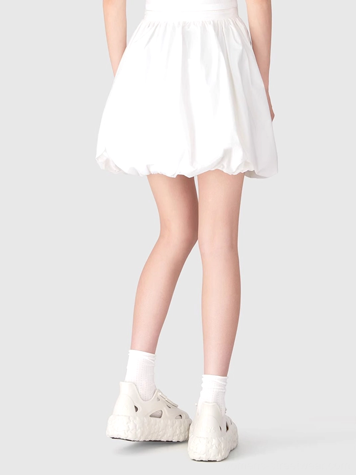 Rear view of beige star platform sandals showing the thick textured heel sole and rugged streetwear outsole
