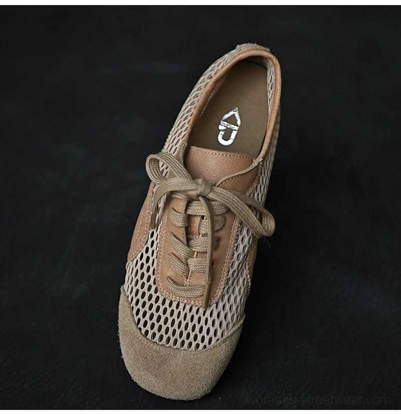 Beige suede and mesh lace-up sneaker shown from above with a symmetrical eyelet layout, branded insole, and layered upper
