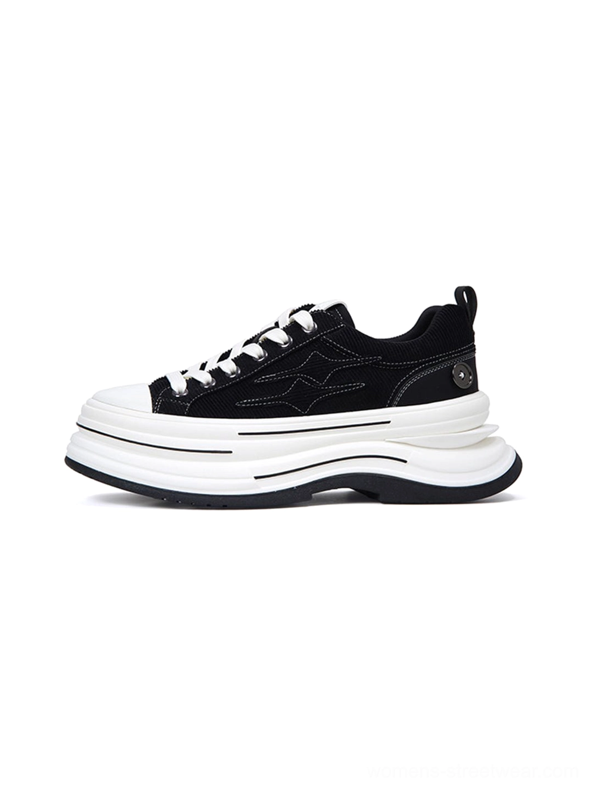 Black 7 cm layered platform canvas sneaker shown from the left side with white laces, stacked white sole, and low-top streetwear silhouette