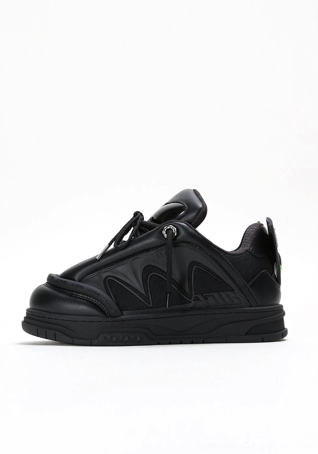 Black alien head platform sneakers detailed view with futuristic stitched upper and lace-up closure