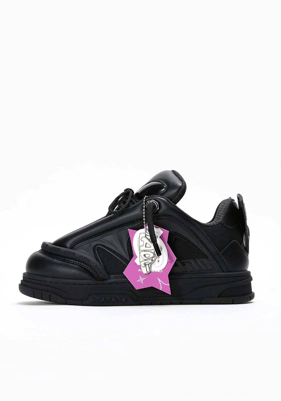 Black alien head platform sneakers with lace-up upper, chunky platform sole, and futuristic streetwear design