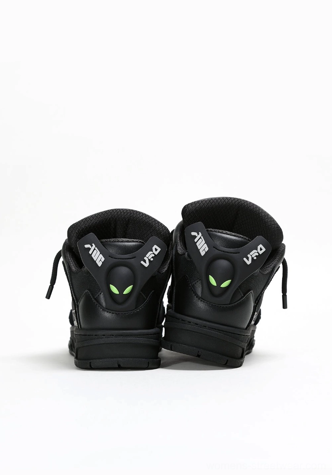 Black alien head platform sneakers rear and side detail showing chunky sole and heel accent