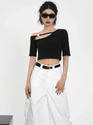 Black asymmetric buckle cut-out ribbed cropped streetwear tee front full-body view with white wide-leg pants