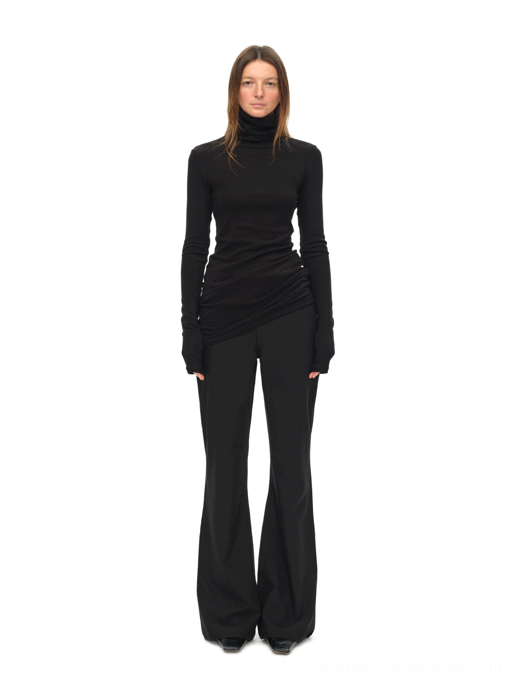 Black high neck fitted knit top with draped side waist detail and black flared trousers