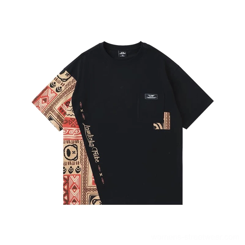Black asymmetric tribal panel oversized heavyweight cotton T-shirt flat lay showing brown patterned sleeve and side panel