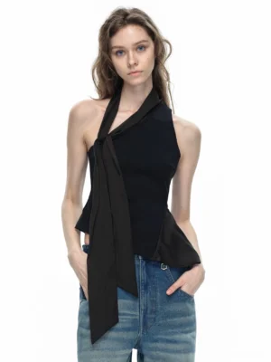Black asymmetrical halter neck top close front view showing knotted neckline draped hem and adjustable side tie detail