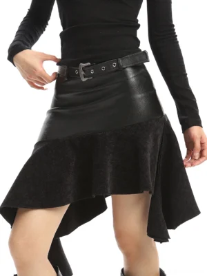 Close-up front view of black asymmetrical patchwork ruffle A-line mini skirt with contrasting glossy and soft textured panels