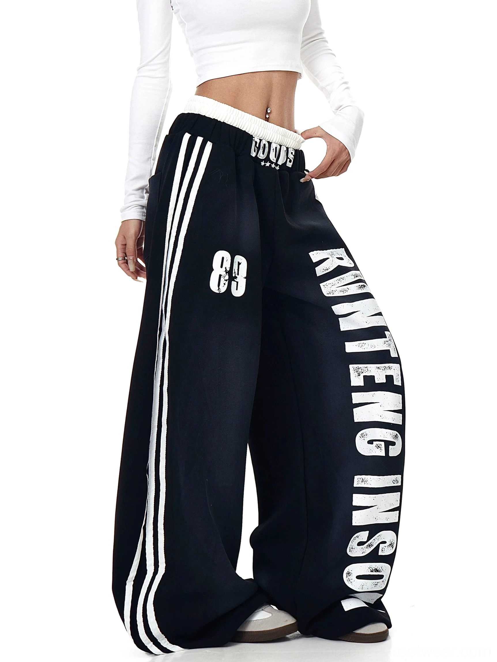 Black baggy fleece sweatpants featuring RVNTENG INSOX vertical print, 89 graphic, wide-leg fit, and striped athletic trim