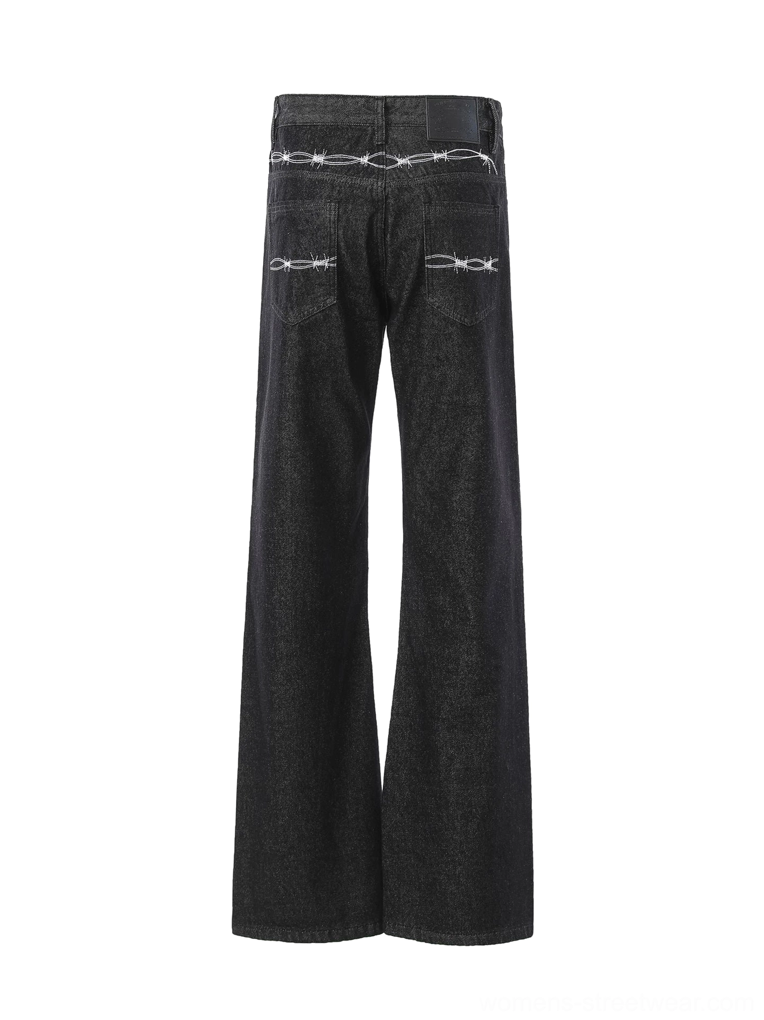 Rear view of black flare jeans featuring white barbed wire embroidery across back pockets and yoke