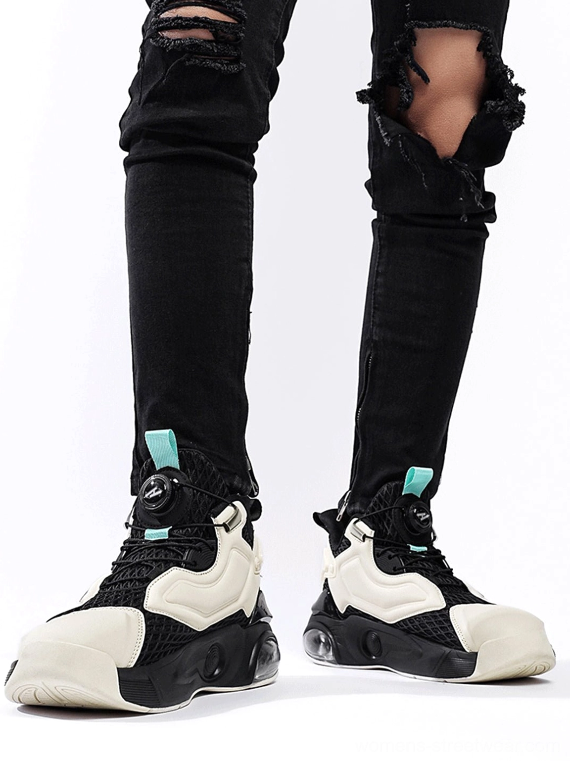 Modern black and blue runner sneakers with cushioned sole and performance-inspired streetwear construction