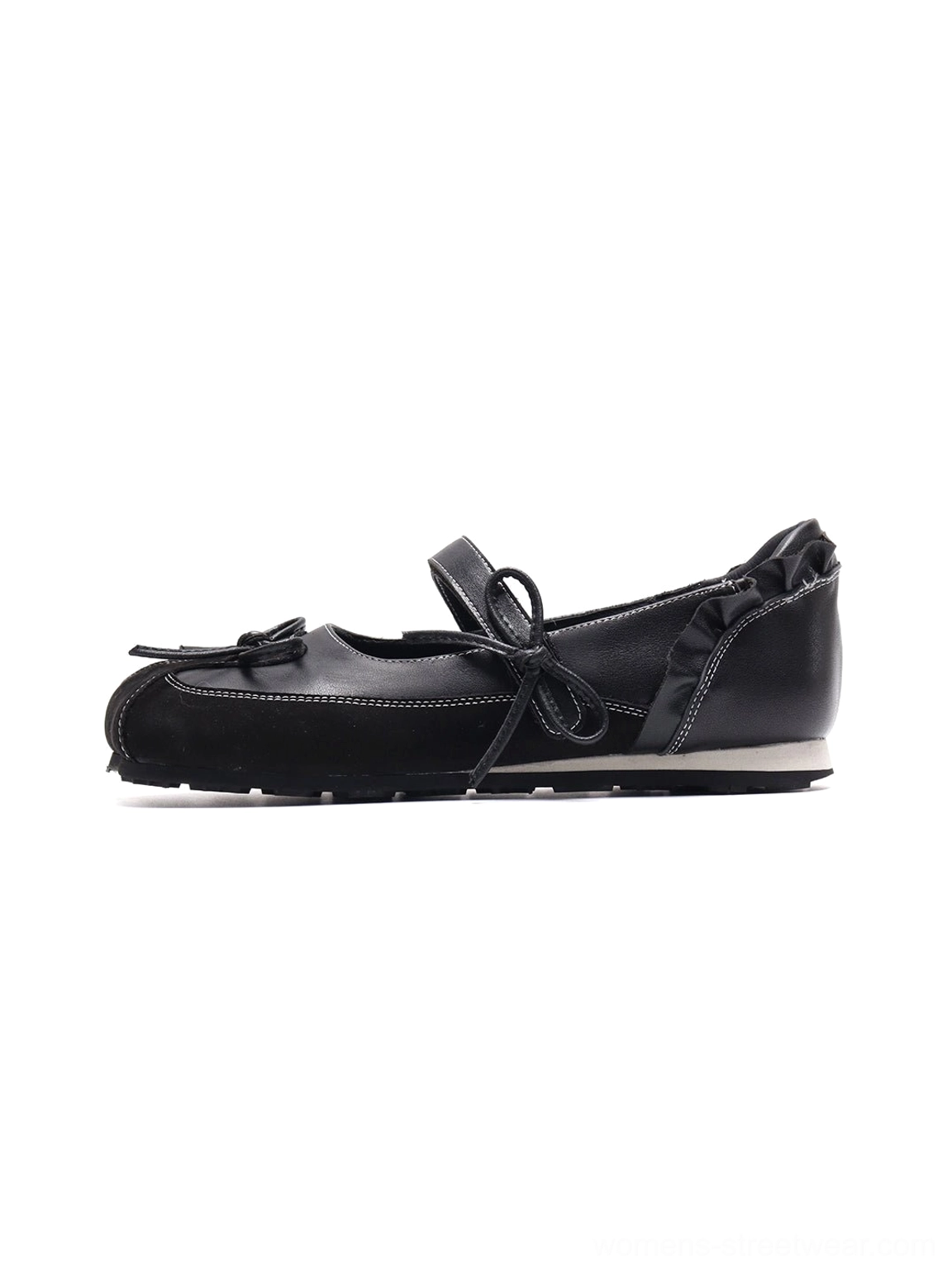Black bow Mary Jane ballet flats side profile with leather-look upper, contrast stitching, ruffled heel trim and segmented white rubber sole