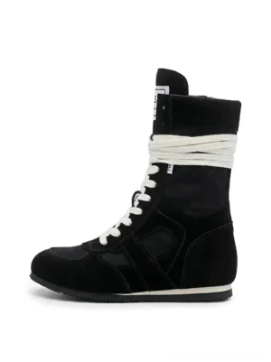 Black boxing trainer boots with mixed suede and canvas upper, white laces, wrapped ankle laces, and white rubber outsole on a clean background