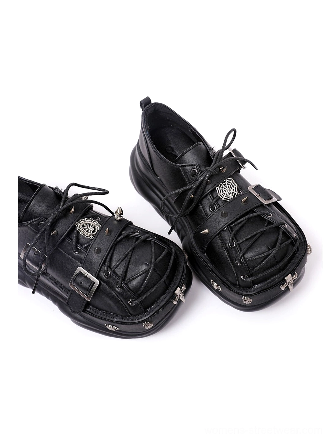 Black buckle cage chunky platform sneakers with gothic punk hardware, layered straps, cross toe accents, and oversized lug soles