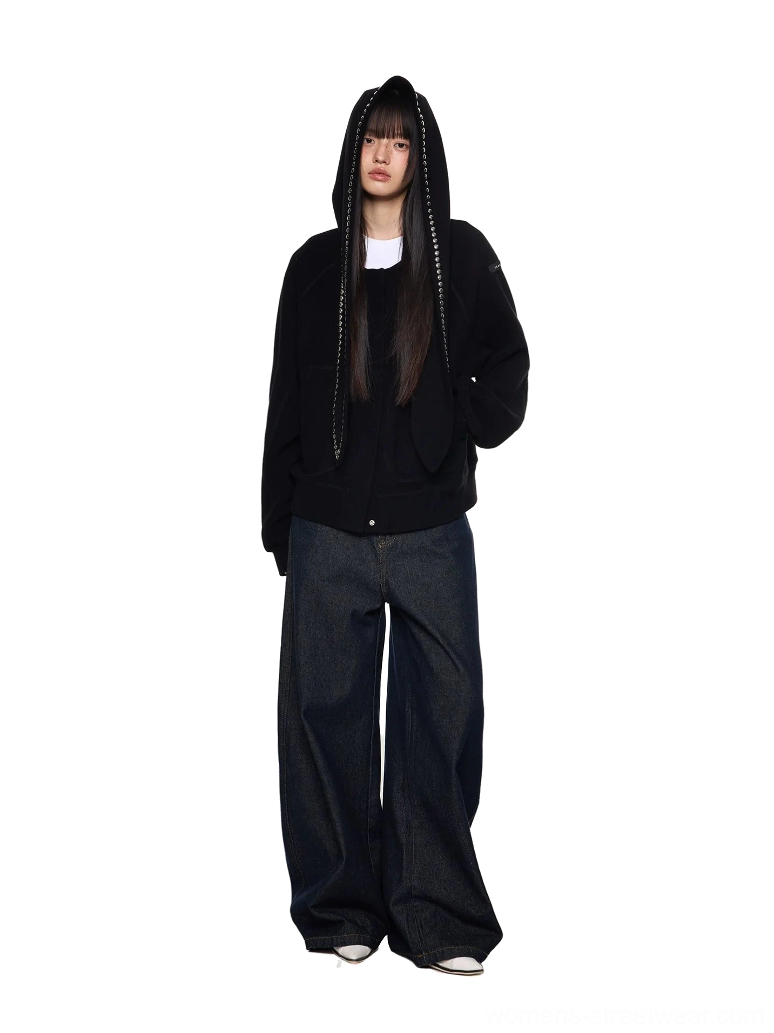Back view of black bunny ear hoodie with long studded hood ears, minimal back design, and loose oversized streetwear fit