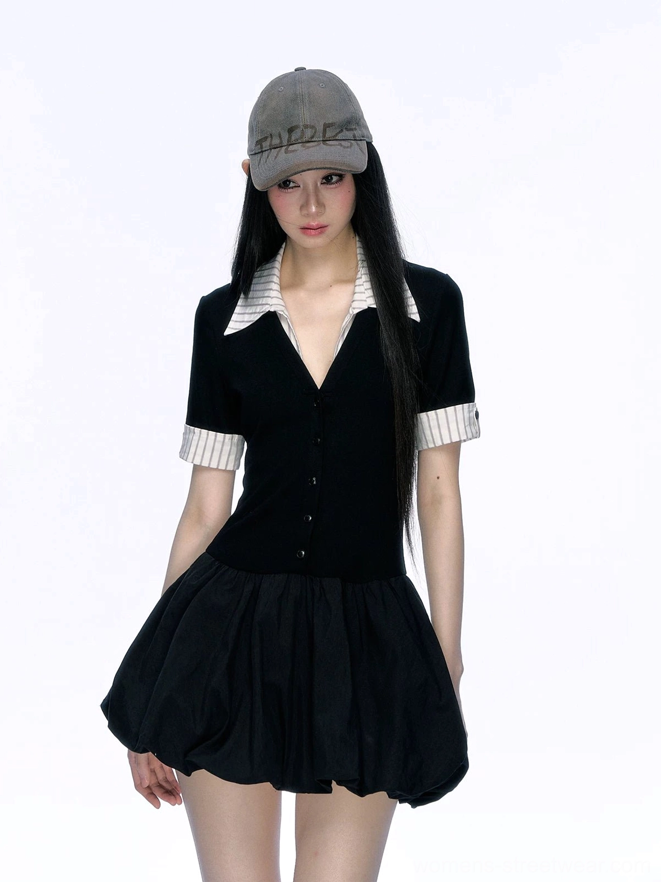 Front view of black button-front polo collar bubble mini dress with striped contrast trim and voluminous skirt