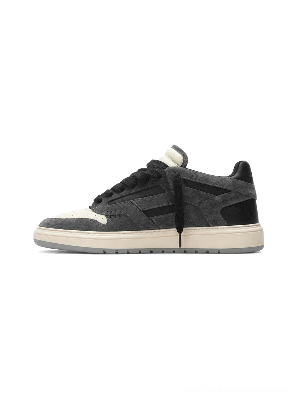 Black and charcoal suede-look colorblock low-top streetwear sneakers with off-white rubber sole side view on white background