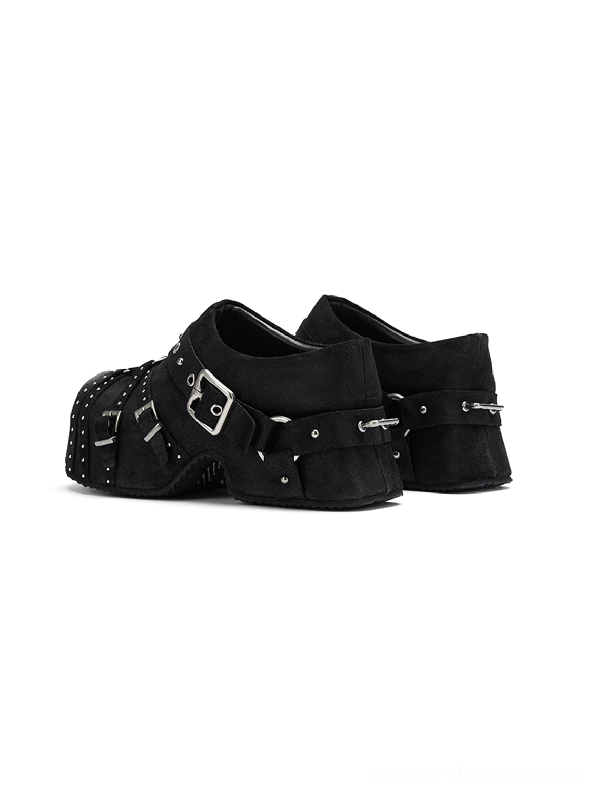 Black chunky platform mules featuring silver-tone buckle straps, studded edges, and a sculpted low heel