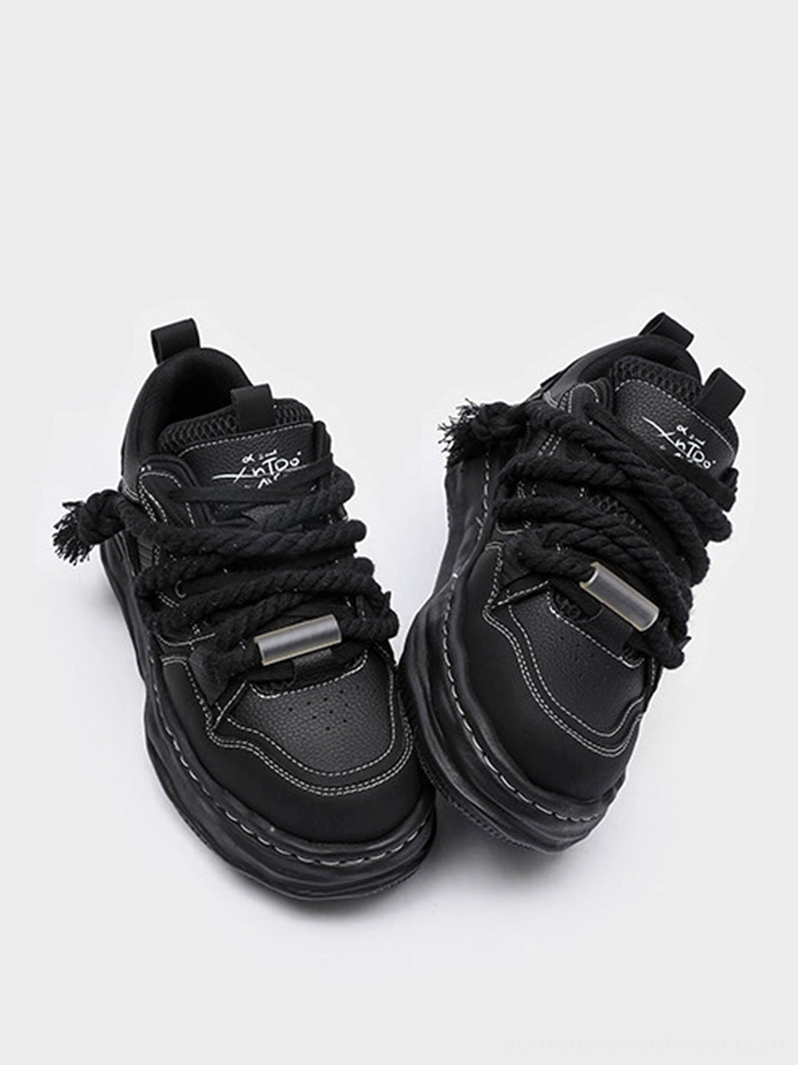 Black chunky sneakers with approximate 7CM platform effect designed for Y2K Acubi and Korean streetwear styling
