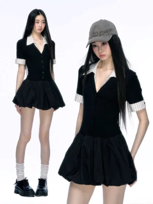 Side view of black contrast collar bubble hem mini dress with striped cuffs and fitted knit bodice in preppy streetwear styling
