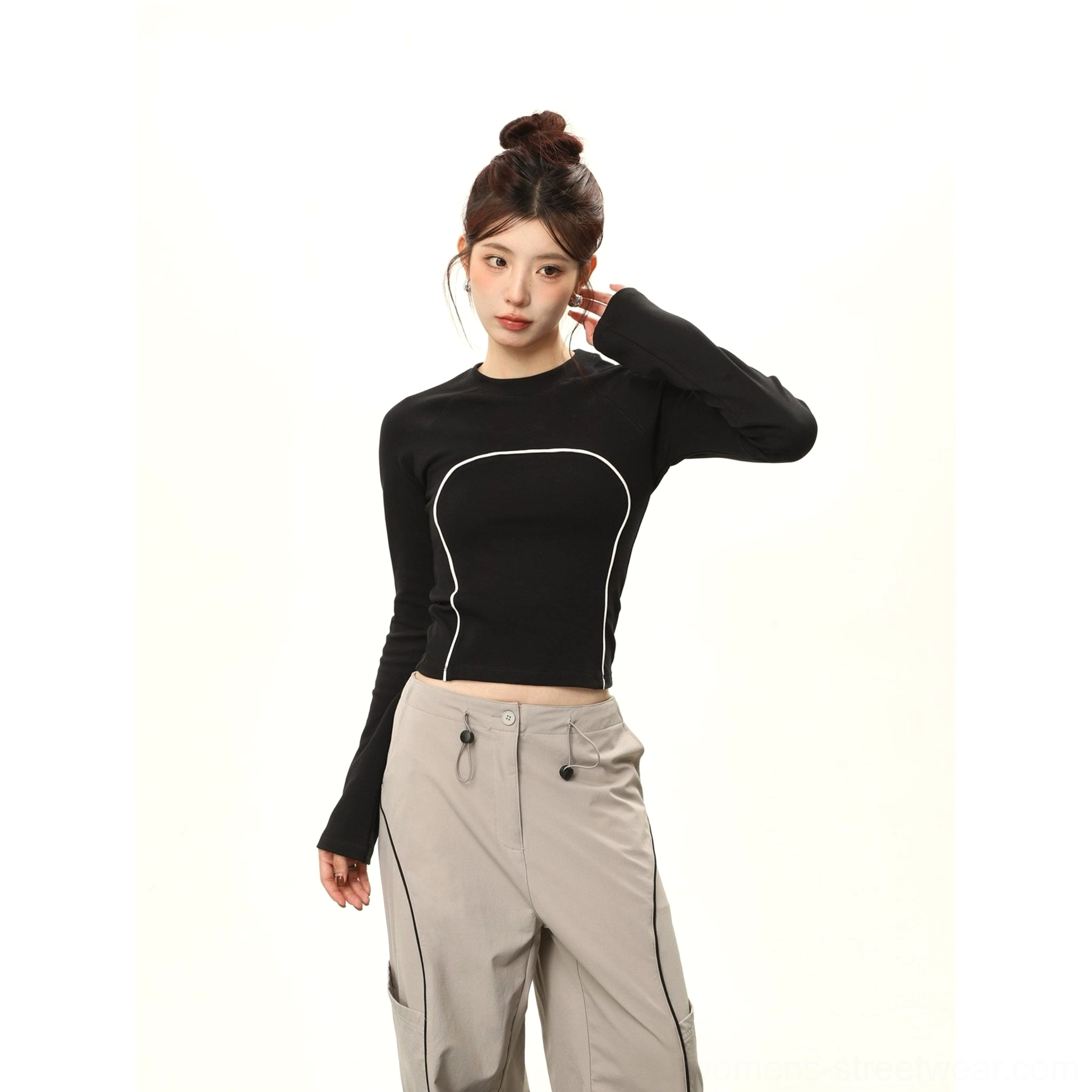 Black contrast stitch cropped long sleeve streetwear top side front view with white seam details