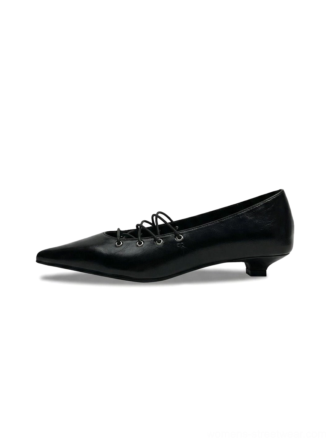 Black corset-lace pointed ballet flats with glossy leather-look upper, metal eyelets, crisscross instep lacing, and low kitten heel shown in side profile