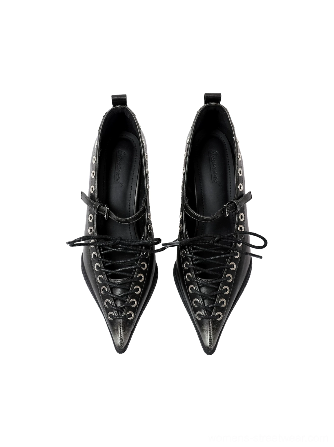 Front studio view of black corset lace pointed Mary Jane wedge pumps with silver metal eyelets, buckle ankle straps, and sharply pointed toes