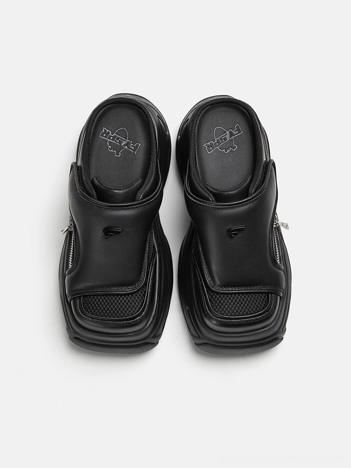 Black covered-toe platform slide sandals viewed from above with square toe, mesh lining, silver side zippers, and chunky Korean streetwear-inspired silhouette