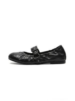 Black crinkled studded Mary Jane ballet flats with adjustable buckle strap shown in side product view