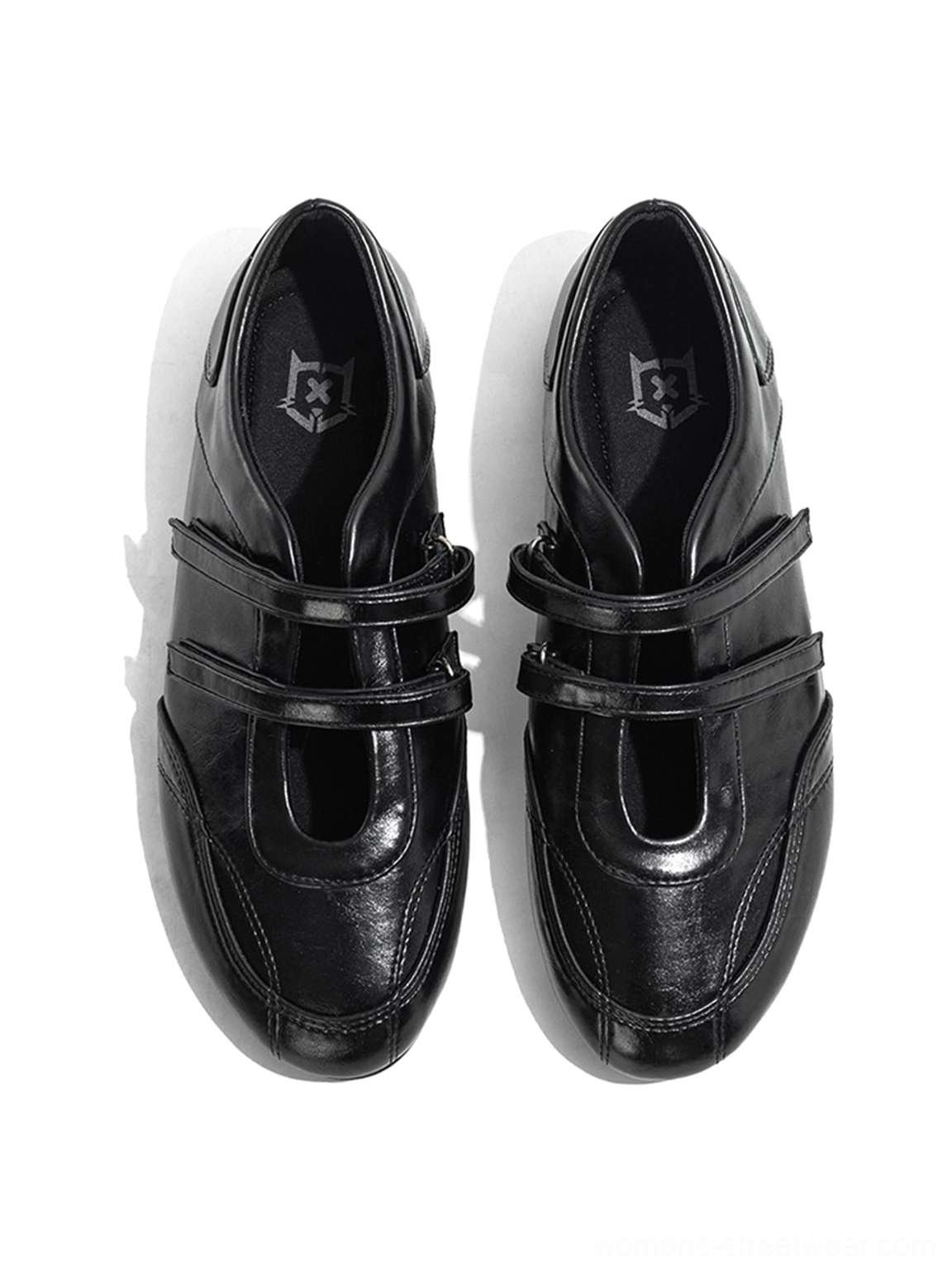 Black crisscross strap leather-look flats with rounded ballet toe and flexible flat sole