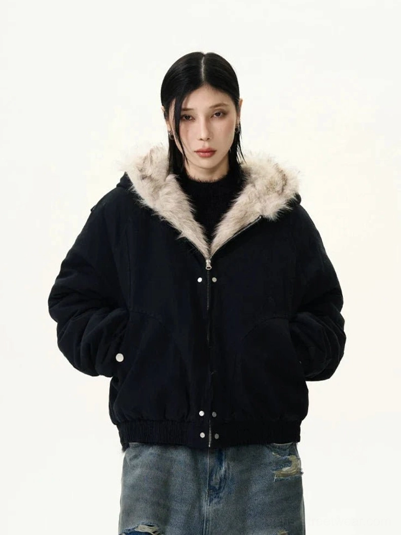 Black cropped bomber jacket with faux fur trimmed hood folded down zipper and snap front closure