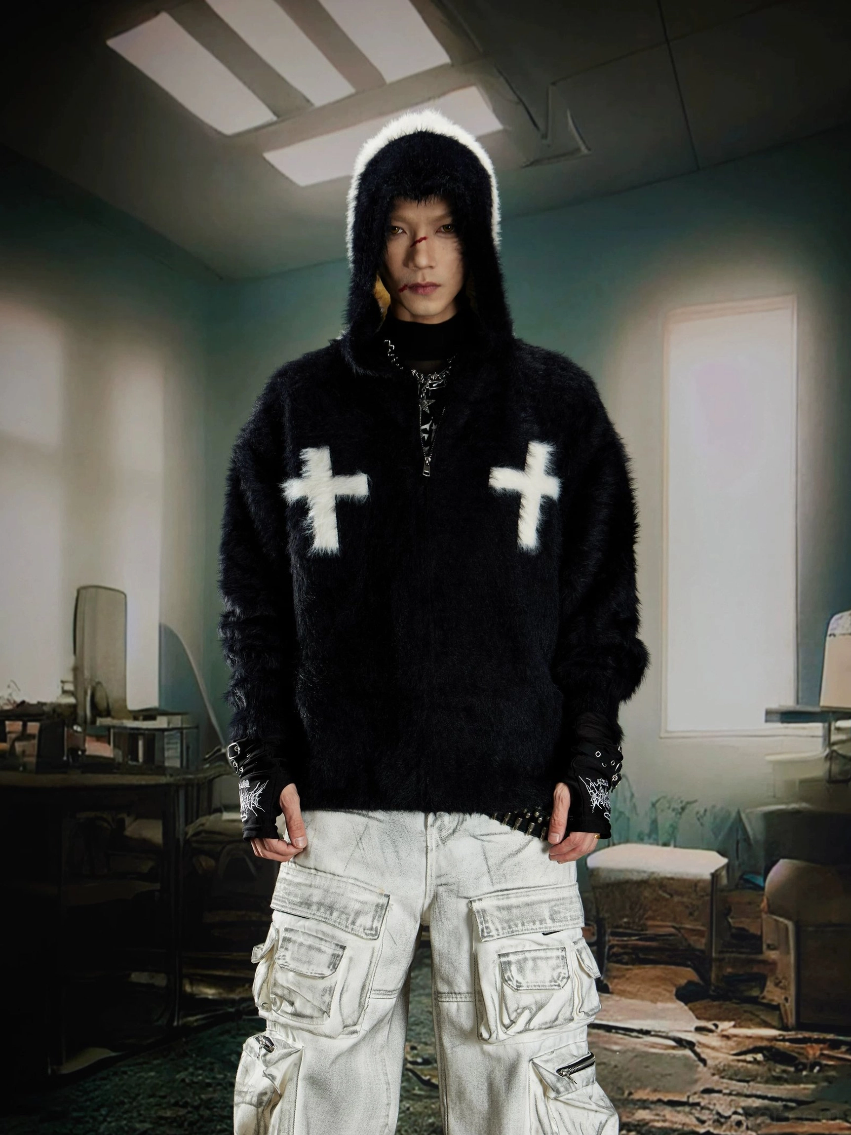 Black crucifix faux fur zip hoodie worn with the hood up in an oversized gothic streetwear fit