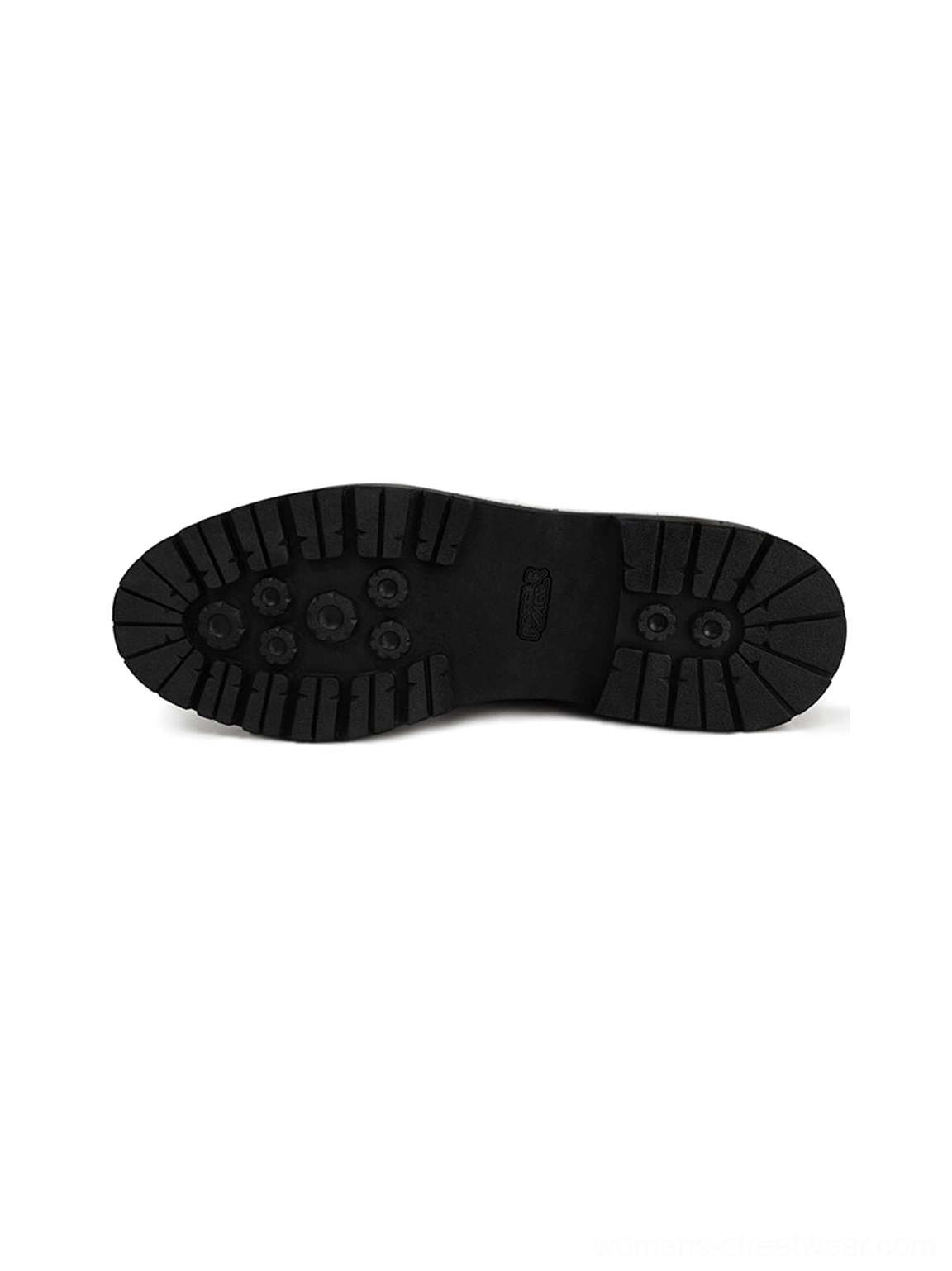 Black rubber lug outsole of croc-embossed leather derby shoes with multi-point traction pattern for streetwear footwear