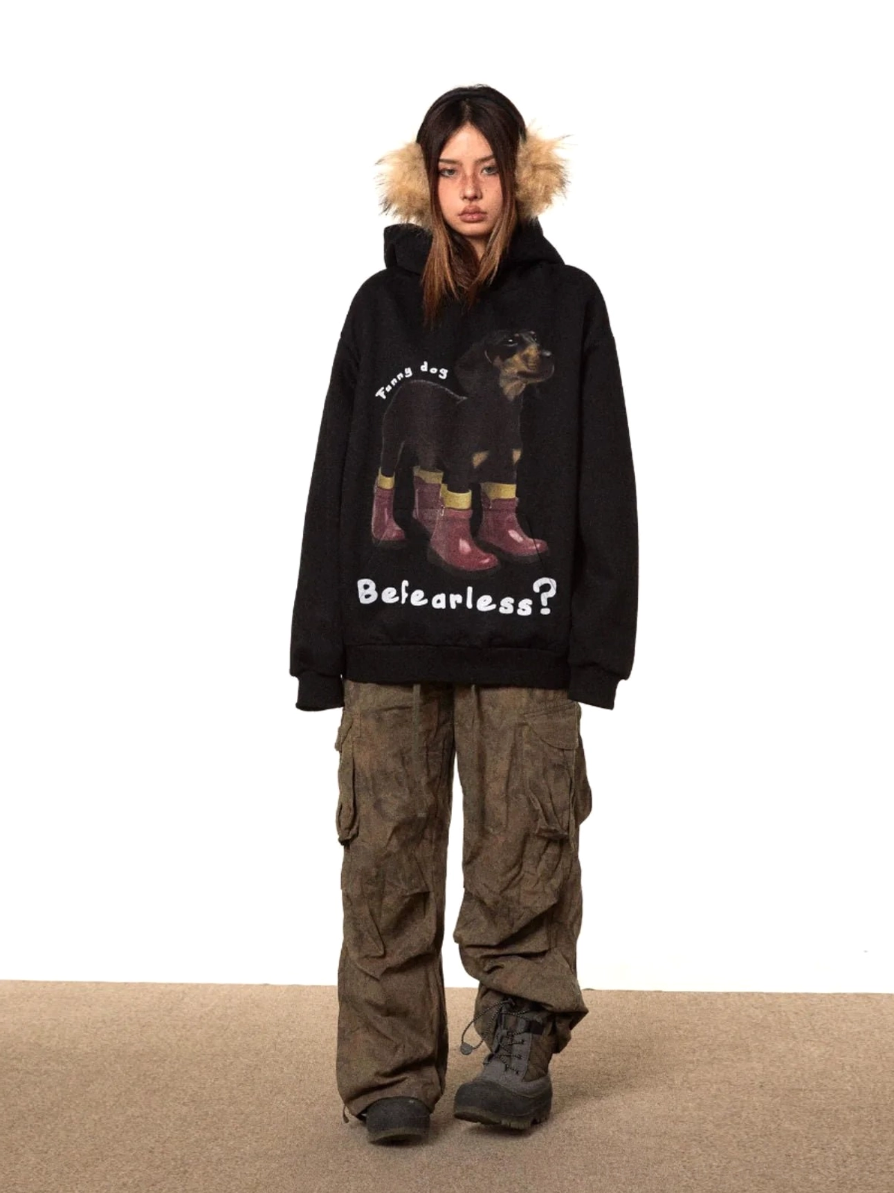 Full front view of a loose black dog print hoodie with complete dachshund artwork, red rain boots, and bold fearless streetwear graphic