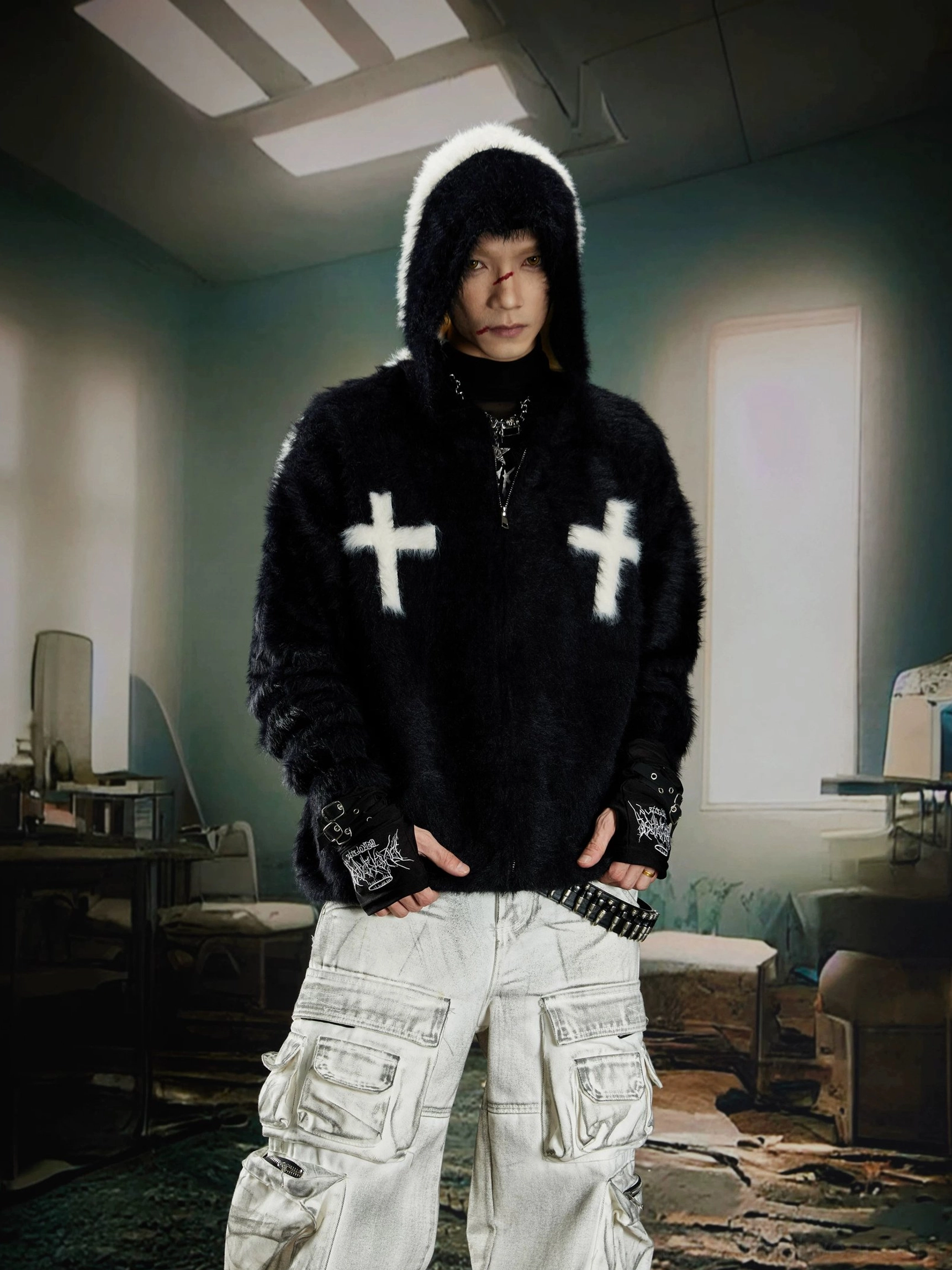 Black faux fur zip hoodie with double white cross embroidery and utility cargo pants