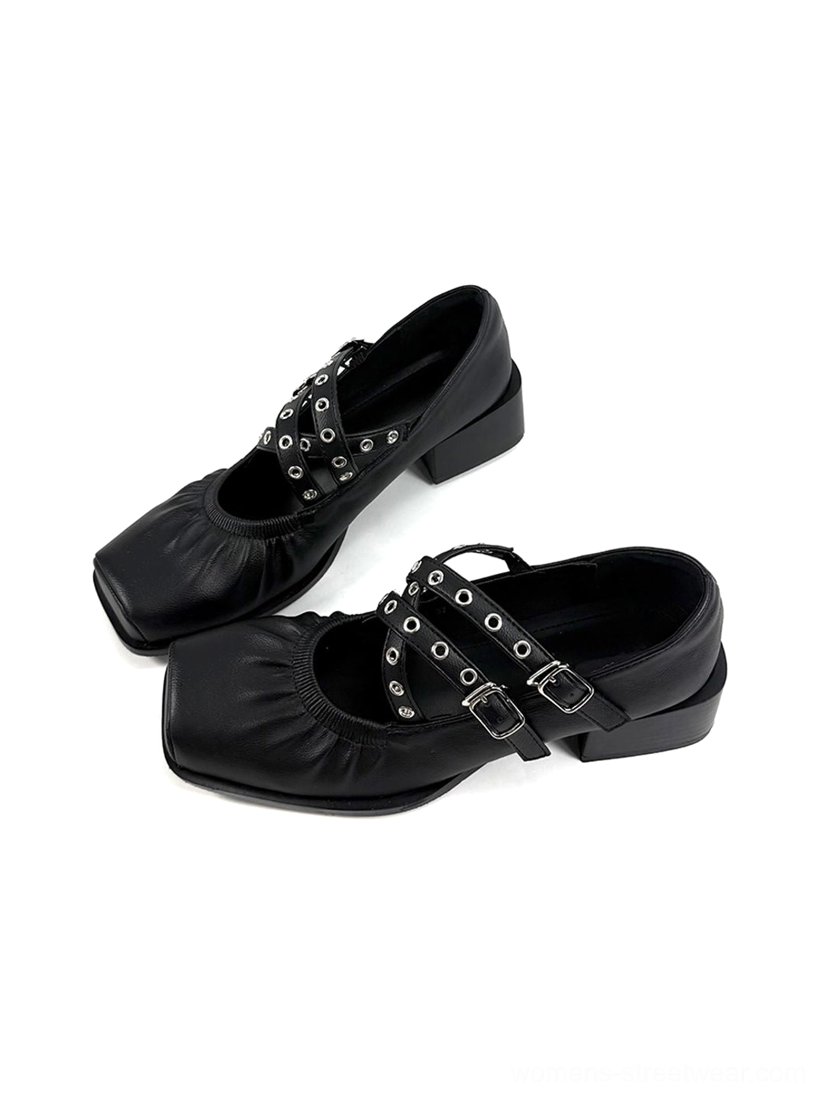 Black artificial leather double-strap Mary Jane flats side angle showing silver grommet hardware and low block heels