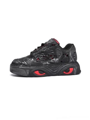 Black dragon relief chunky platform sneakers shown in a left side profile with embossed dragon artwork, red sole accents, and thick black platform outsole