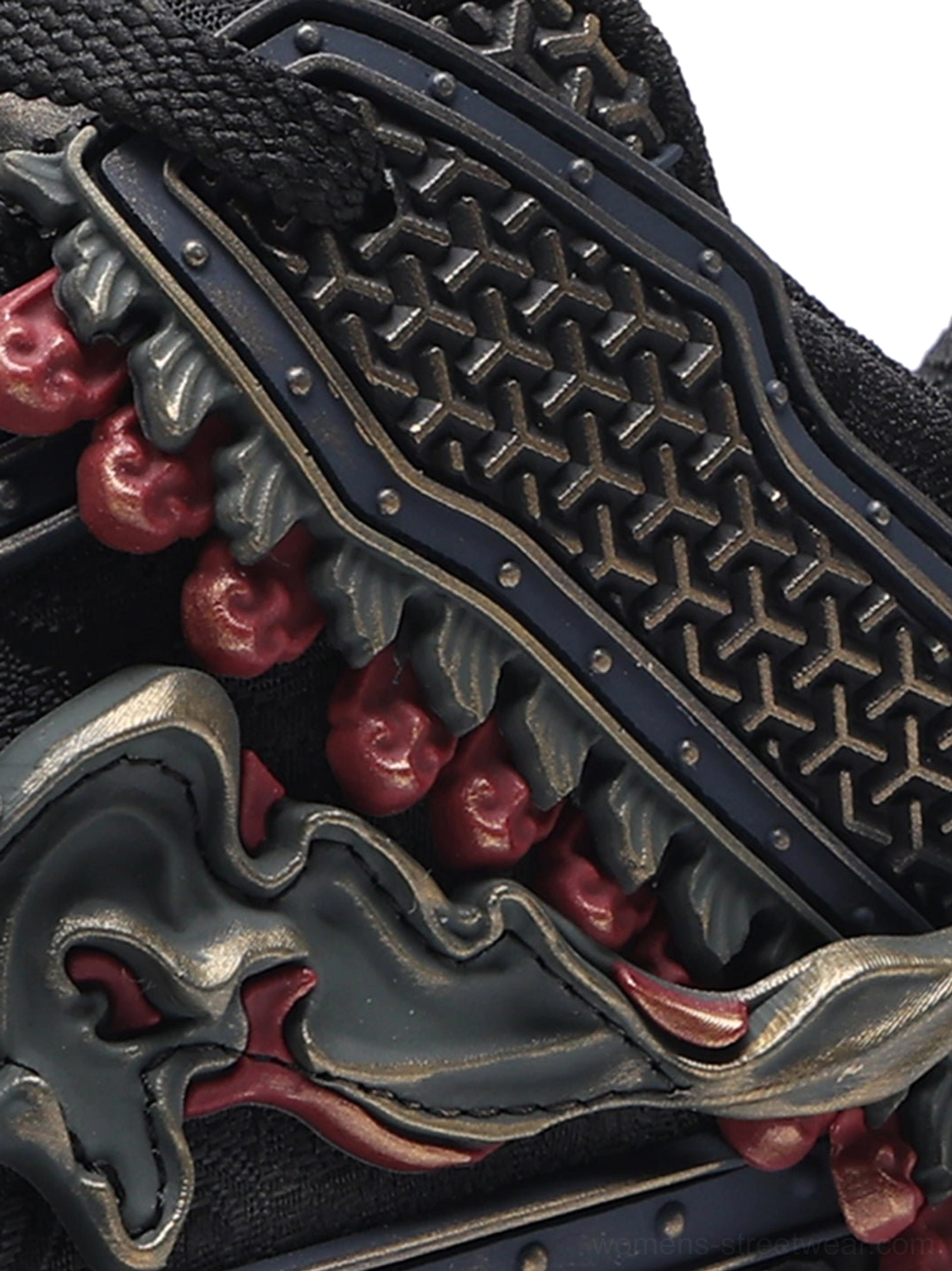 Black dragon streetwear sneakers highlighting dark textured construction, dimensional decorative details, and low-top silhouette