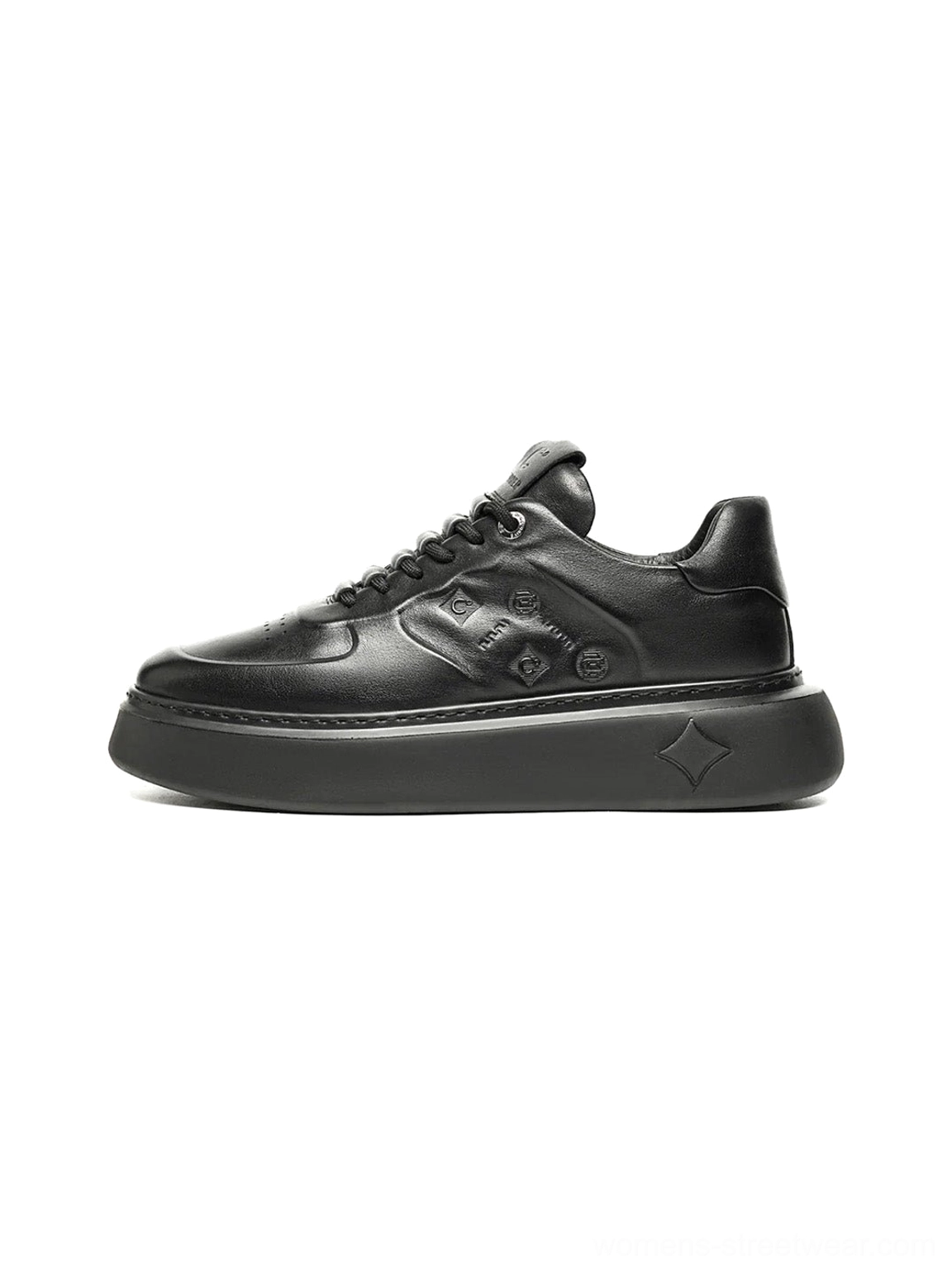 Black embossed platform low-top streetwear sneakers side top view on a white background